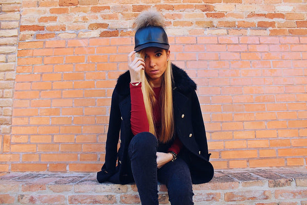 See how Blogger Elena Cano style our Black Leather Fur Pom Cap!