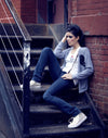 Model wearing studded converse